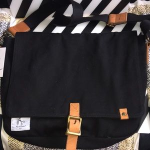 Robert Graham black with leather trim messenger bag. New with tags.